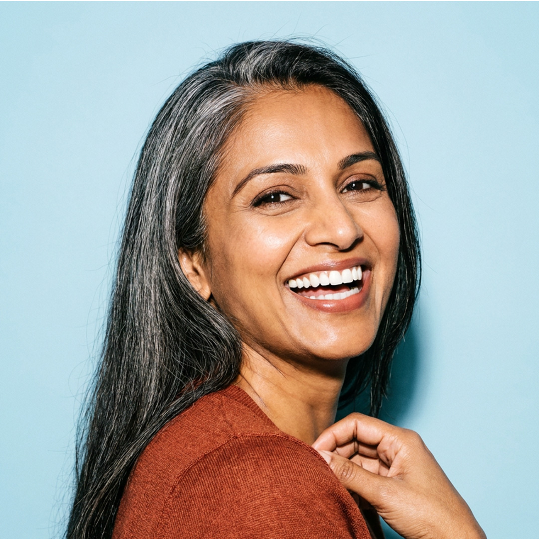 Smiling Farah Family Dental patient