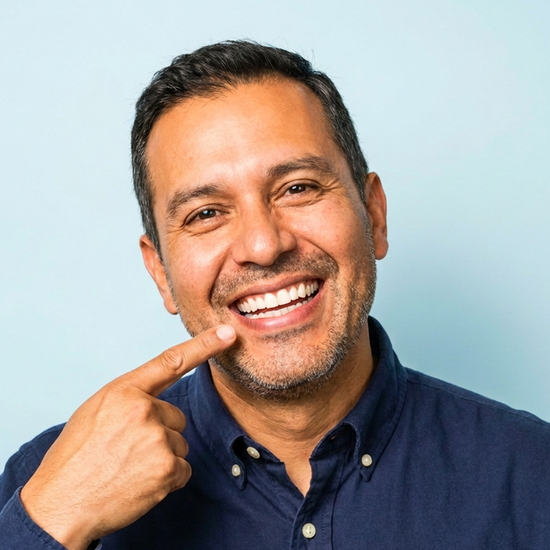 Smiling Farah Family Dental patient
